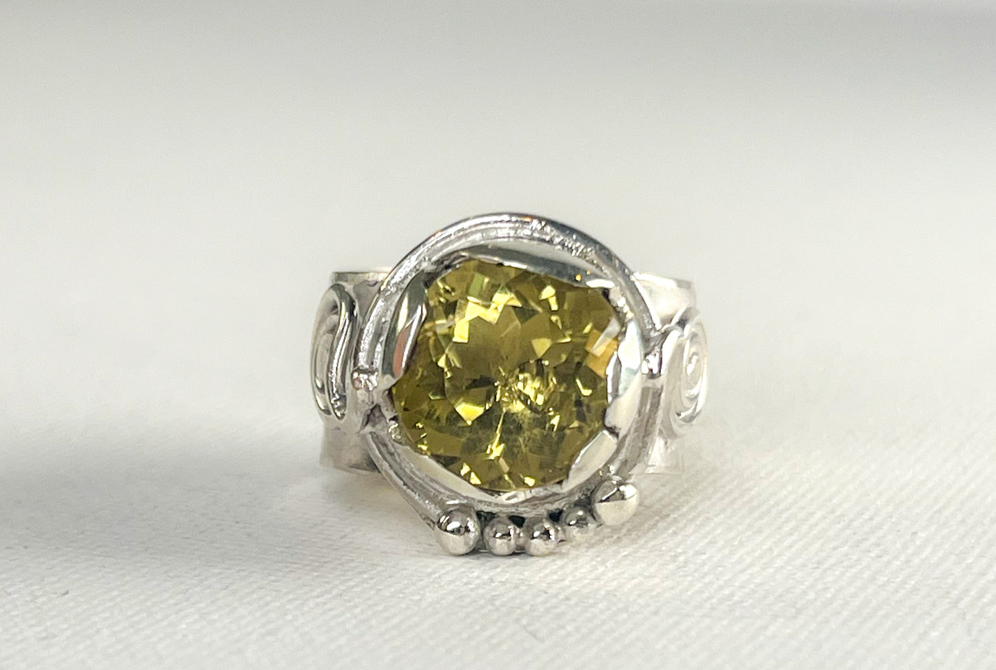 Sterling Silver ring with Green golden