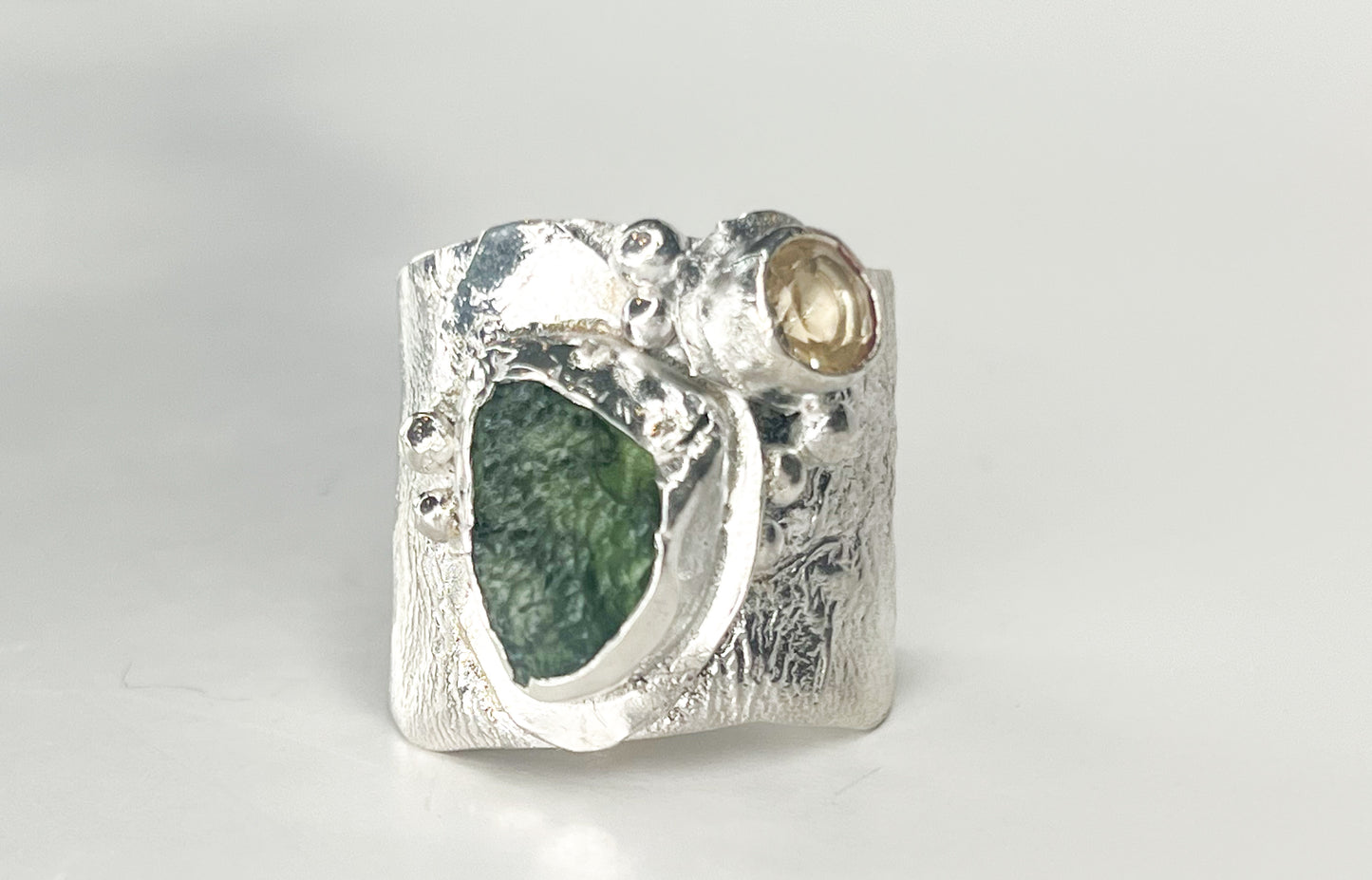 Moldavite and citrine silver ring
