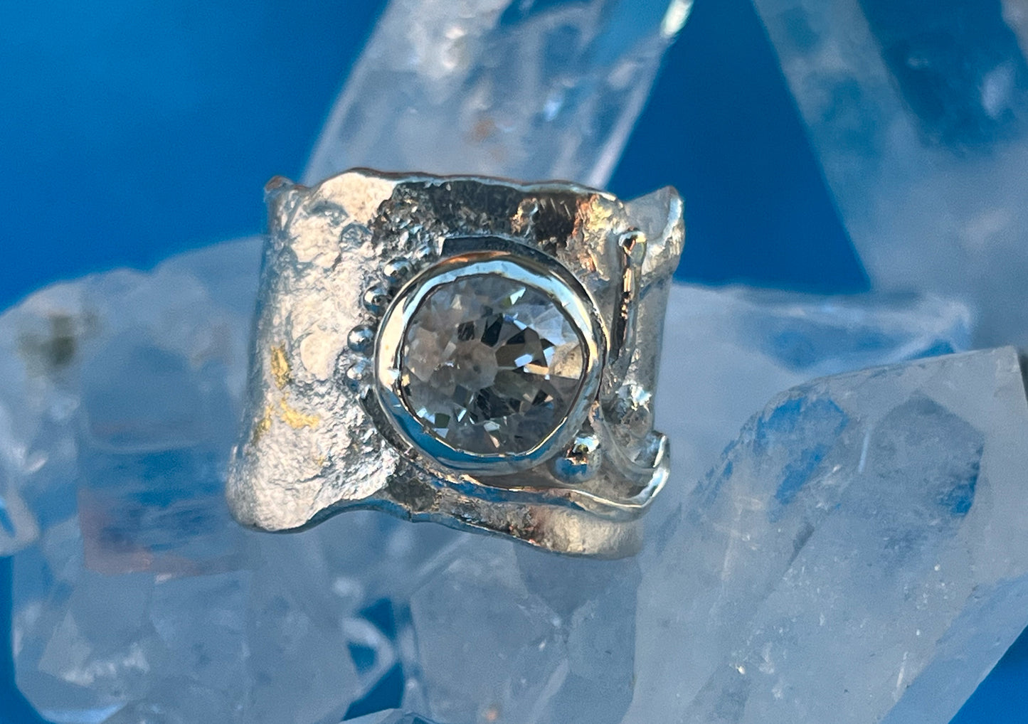 Sterling Silver ring with       Faceted Clear Quartz