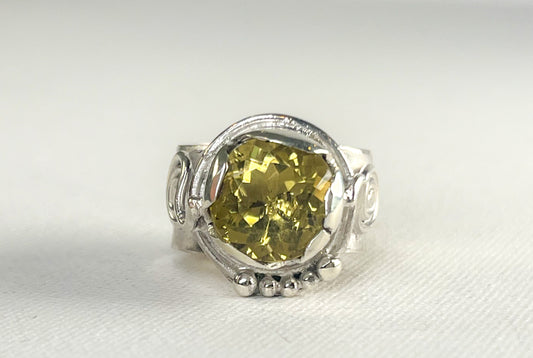 Silver Ring with Green Golden Crystal