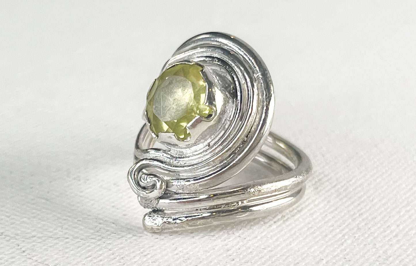 Silver Ring with Green Golden Crystal